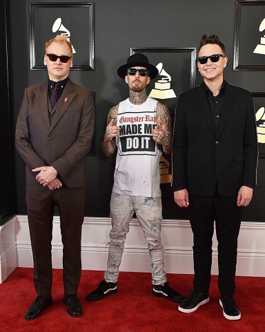 Matt Skiba, from left, Travis Barker, and Mark Hoppus of the musical group Blink-182 arrive at the 59th annual Grammy Awards at the Staples Center, in Los Angeles
The 59th Annual Grammy Awards - Arrivals, Los Angeles, USA - 12 Feb 2017