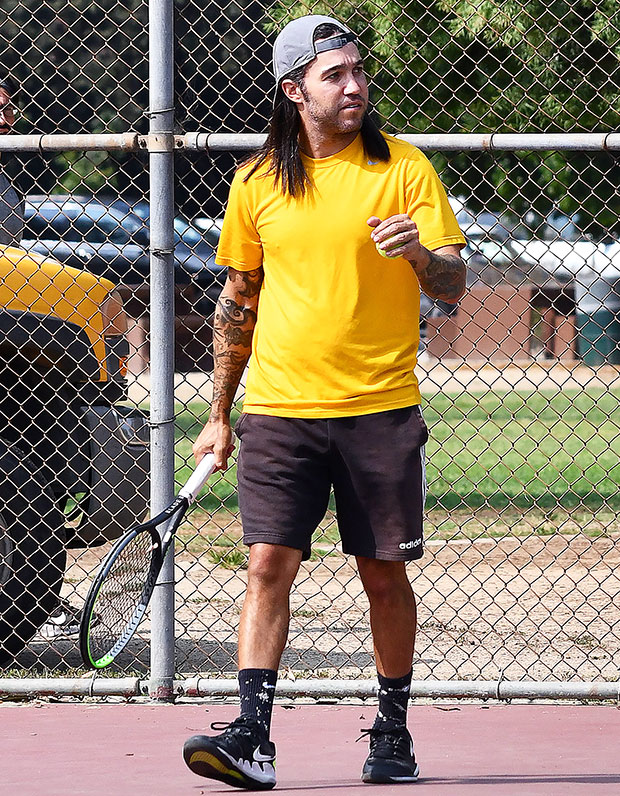 Pete Wentz playing tennis