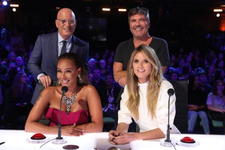 AMERICA'S GOT TALENT: THE CHAMPIONS -- "The Champions Five" Episode 105 -- Pictured: (l-r) Howie Mandel, Mel B, Simon Cowell, Heidi Klum -- (Photo by: Jordin Althaus/NBC)