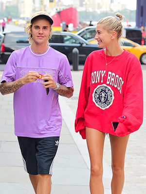 Justin Bieber and his model fianc?e Hailey Baldwin were spotted out in New York, NY as they enjoyed a cute movie date. The pair arrived alone to watch 'Mission: Impossible ? Fallout' at a dine-in movie theatre, but that didn't stop Justin from bringing his own snacks along. He munched on a handful of raisins, even offering the paparazzi some. He wore a purple shirt and black shorts, while she wore an over-sized Stony Brook University crew neck and short shorts.Pictured: Justin Bieber,Hailey BaldwinRef: SPL5012541 250718 NON-EXCLUSIVEPicture by: 247PAPS.TV / SplashNews.comSplash News and PicturesLos Angeles: 310-821-2666New York: 212-619-2666London: 0207 644 7656Milan: +39 02 4399 8577Sydney: +61 02 9240 7700photodesk@splashnews.comWorld Rights, No Portugal Rights
