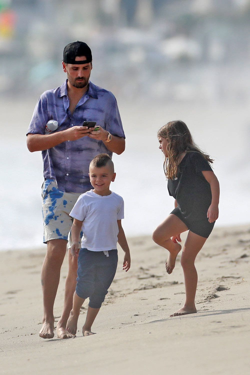 *EXCLUSIVE* Scott Disick goes for a walk on the beach with kids in Malibu