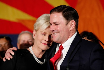 Doug Ducey, Cindy McCain. Republican Arizona Gov. Doug Ducey embraces Cindy McCain, wife of the late U.S. Sen. John McCain, while speaking to supporters, at an election night party in Scottsdale, Ariz. Incumbent Ducey defeated democratic challenger David Garcia for his second term
Election 2018 Governor Ducey Arizona, Scottsdale, USA - 06 Nov 2018