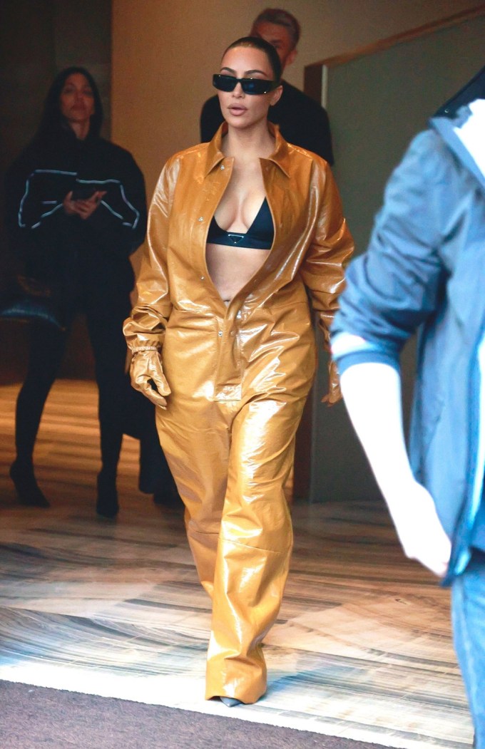 Kim Kardashian in Bra Top & a Leather Jumpsuit