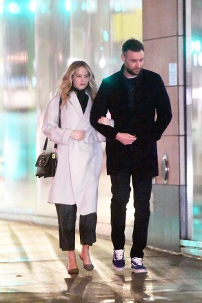 Jennifer Lawrence is photographed this evening showing her giant engagement ring while holding hands with her fiancee Cooke Maroney after having dinner with friends at Chef's Club restaurant in New York City. Cooke at some point came out few times to smoke a cigarette and having a conversation with a lady outside the restaurant

Pictured: Jennifer Lawrence,Cooke Maroney
Ref: SPL5067100 240219 NON-EXCLUSIVE
Picture by: Elder Ordonez / SplashNews.com

Splash News and Pictures
Los Angeles: 310-821-2666
New York: 212-619-2666
London: 0207 644 7656
Milan: 02 4399 8577
photodesk@splashnews.com

World Rights, No Portugal Rights