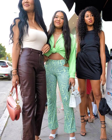 Influencer Ming Lee Simmons arrives for the launch of her collaboration boohoo x Ming Lee Simmons collection at Catch LA in Los Angeles. Ming is wearing a peekaboo cutout pair of summer pants with a matching blouse tied into a knot on the front with white wedge shoes. Ming is joined by her mother Kimora Lee Simmons and sister Aoki Lee Simmons!Pictured: Ming Lee Simmons,Kimora Lee Simmons,Aoki Lee SimmonsRef: SPL5240597 200721 NON-EXCLUSIVEPicture by: Tim Regas / SplashNews.comSplash News and PicturesUSA: +1 310-525-5808London: +44 (0)20 8126 1009Berlin: +49 175 3764 166photodesk@splashnews.comWorld Rights