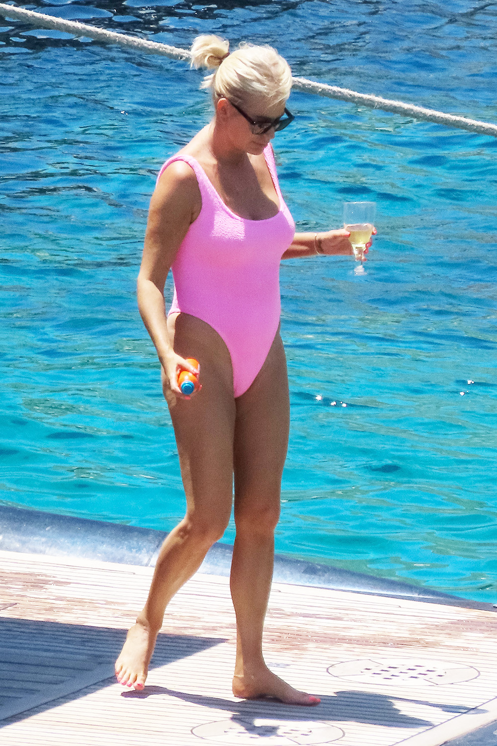 EXCLUSIVE: Caroline Stanbury flaunted a pink bikini with her husband Sergio Carrallo on the SuperYacht with their friends