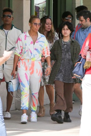 Miami, FL  - *EXCLUSIVE*  - Jennifer Lopez rocks a multicolored jumpsuit and matching Nike's with a Louis Vuitton purse as she goes out for a bite with her kids Emme and Max, and friends in Miami, Florida, while her new beau Ben Affleck relaxes in California.

Pictured: Jennifer Lopez, Emme Maribel Muniz, Maximilian David Muniz

BACKGRID USA 9 JUNE 2021 

BYLINE MUST READ: MiamiPIXX / BACKGRID

USA: +1 310 798 9111 / usasales@backgrid.com

UK: +44 208 344 2007 / uksales@backgrid.com

*UK Clients - Pictures Containing Children
Please Pixelate Face Prior To Publication*