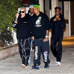 Beverly Hills, CA - *EXCLUSIVE* A camera-shy Amber Rose reveals a new tattoo that reads “Bash Slash”, a tribute to her kids Sebastian and Slash while out for dinner with boyfriend Alexander Edwards and friends at Matsuhisa in Beverly Hills. Alexander complemented Amber's ink with the kid's birthdays separated by a lightning bolt tattooed across his forehead.Pictured: Amber Rose, Alexander EdwardsBACKGRID USA 17 FEBRUARY 2020 USA: +1 310 798 9111 / usasales@backgrid.comUK: +44 208 344 2007 / uksales@backgrid.com*UK Clients - Pictures Containing ChildrenPlease Pixelate Face Prior To Publication*