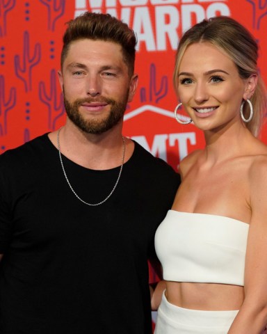 Chris Lane, Lauren Bushnell. Chris Lane, left, and Lauren Bushnell arrive at the CMT Music Awards, at the Bridgestone Arena in Nashville, Tenn2019 CMT Music Awards - Arrivals, Nashville, USA - 05 Jun 2019