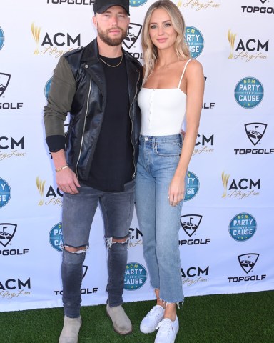 Chris Lane and Lauren Bushnell
ACM Lifting Lives TopGolf Tee-Off, Arrivals, Las Vegas, USA - 06 Apr 2019