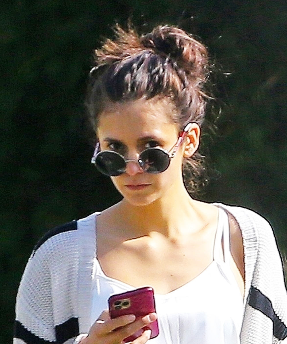 Nina Dobrev fails to pick up Maverick's poop