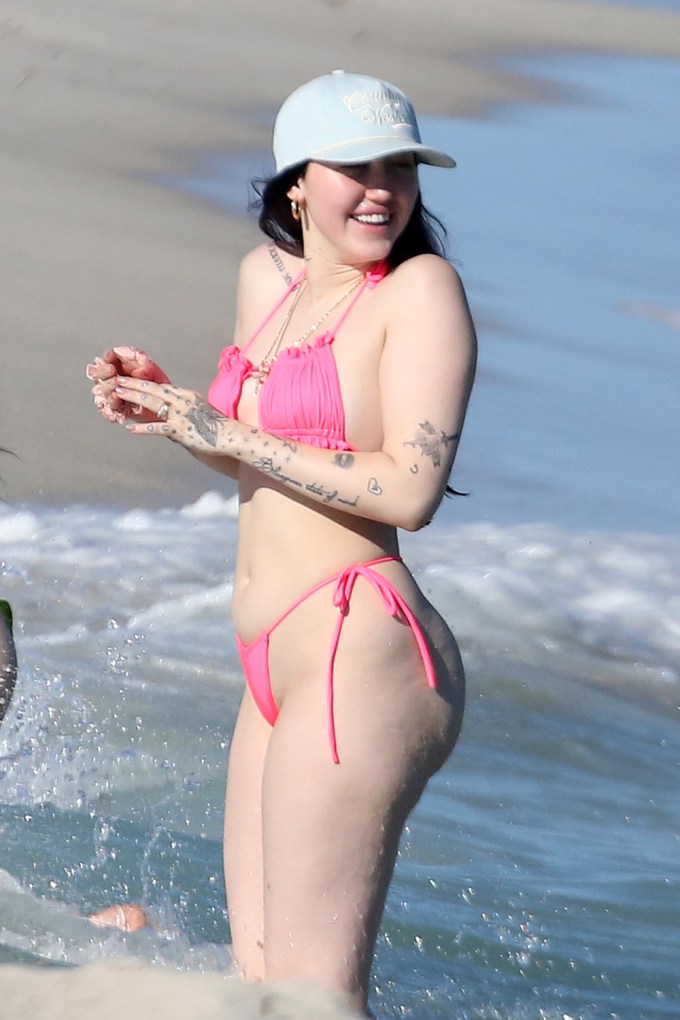 Noah Cyrus in a pink bikini