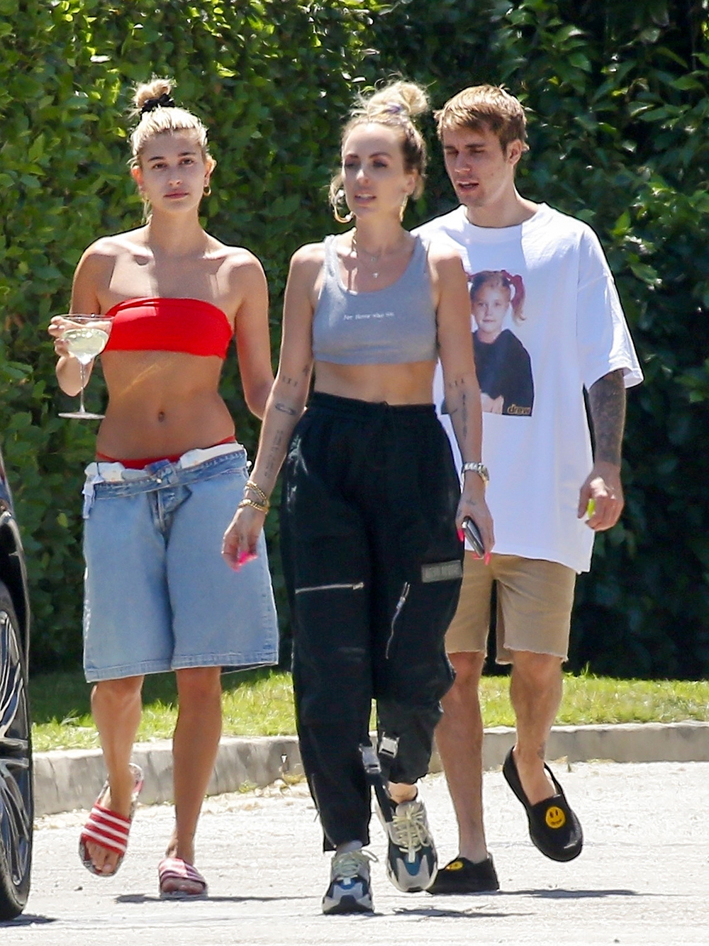 Beverly Hills, CA  - *EXCLUSIVE*  - Justin Bieber and Hailey Baldwin Bieber are enjoying the warm Cali sun in Beverly Hills. Hailey, who wears a red bikini underneath her oversized jean shorts, sips on a drink while walking next to her hubby JB. The couple enjoyed a day out together amidst ongoing war with Taylor Swift and Bieber's manager Scooter Braun.

Pictured: Justin Bieber, Hailey Bieber

BACKGRID USA 2 JULY 2019 

USA: +1 310 798 9111 / usasales@backgrid.com

UK: +44 208 344 2007 / uksales@backgrid.com

*UK Clients - Pictures Containing Children
Please Pixelate Face Prior To Publication*