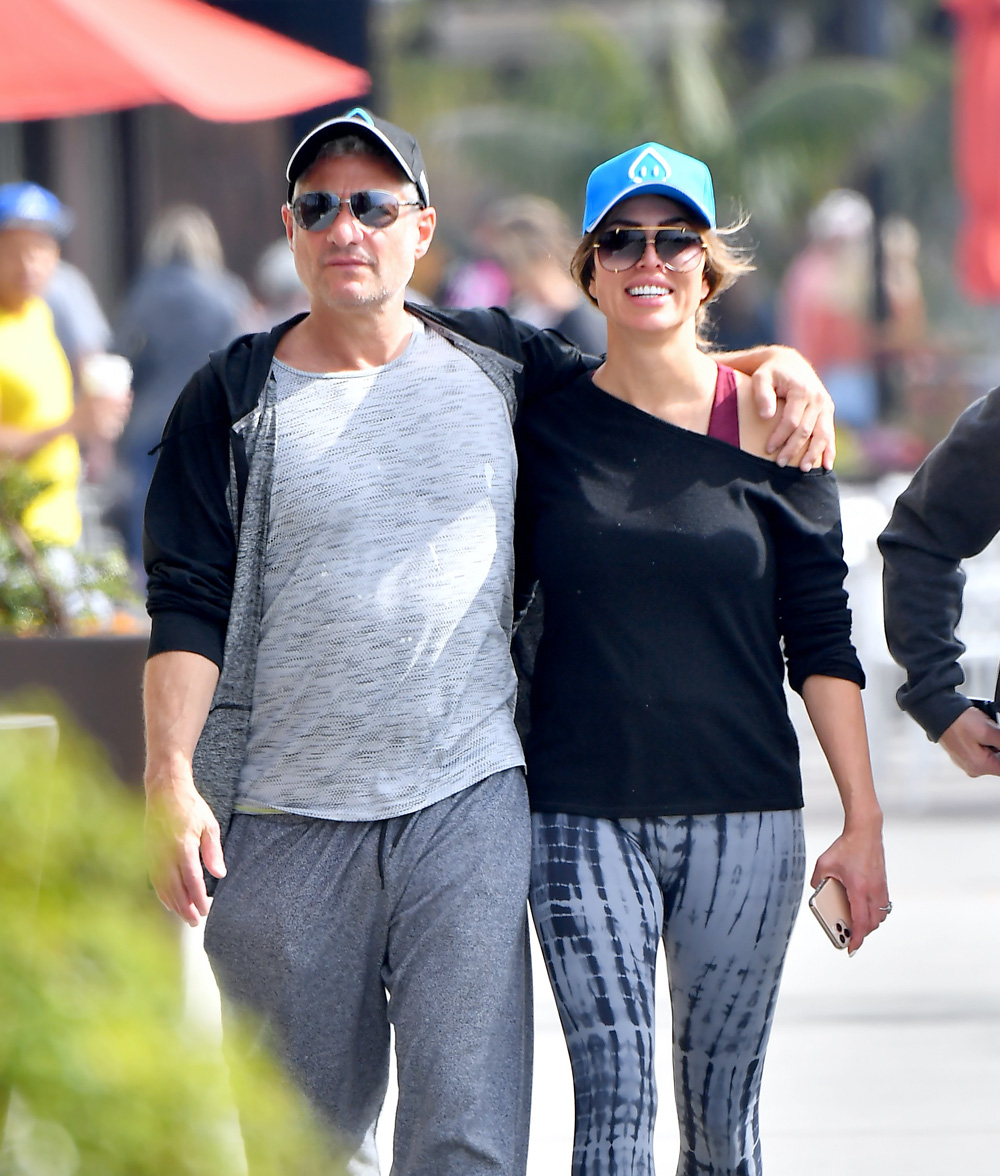 EXCLUSIVE: Kelly Dodd and her fiancé Rick Leventhal pack on the PDA as they head out for lunch in Laguna Beach