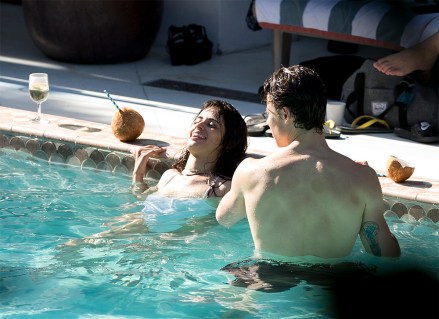 Shawn Mendes and Camila Cabello are seen during fun packed afternoon in Miami. The love birds were seen kissing while taking a swim as Shawn Mendes his water, Manuel Mendes looked down from a restaurant. Shawn Mendes who has had a off day from his busy tour used the day to take his girlfriend Camila Cabello to the beach and some pool time in Miami for a fun filled day. Camila Cabello had a very revealing white bathing suit on .The two were seen getting close to each other during a cool down in the ocean. Shawn Mendes had some bruises on his back.

Pictured: Camila Cabello,Shawn Mendes
Ref: SPL5106599 290719 NON-EXCLUSIVE
Picture by: SplashNews.com

Splash News and Pictures
Los Angeles: 310-821-2666
New York: 212-619-2666
London: 0207 644 7656
Milan: +39 02 56567623
photodesk@splashnews.com

World Rights