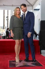 Jill Goodacre, Harry Connick Jr. Jill Goodacre, left, and Harry Connick Jr. pose atop a star during a ceremony honoring Harry Connick Jr. with a star at the Hollywood Walk of Fame, in Los Angeles
Harry Connick Jr. Honored with a Star on the Hollywood Walk of Fame, Los Angeles, USA - 24 Oct 2019