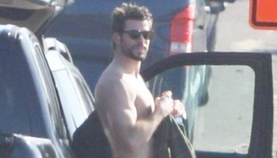 Liam Hemsworth surfing