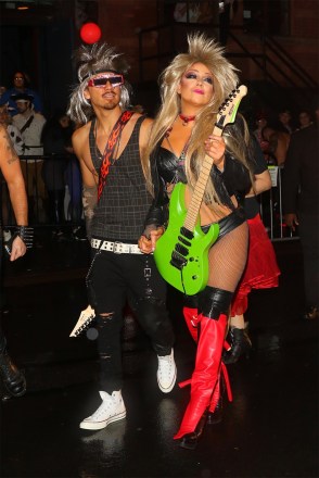 New York, NY  - Mariah Carey bares her toned tummy as she arrives at Heidi Klum’s Halloween Party with her boyfriend Bryan Tanaka.

Pictured: Bryan Tanaka, Mariah Carey

BACKGRID USA 31 OCTOBER 2019 

BYLINE MUST READ: @TheHapaBlonde / BACKGRID

USA: +1 310 798 9111 / usasales@backgrid.com

UK: +44 208 344 2007 / uksales@backgrid.com

*UK Clients - Pictures Containing Children
Please Pixelate Face Prior To Publication*