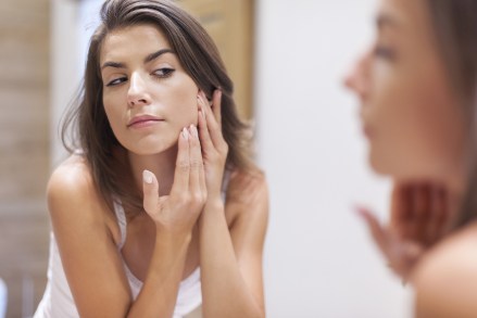 Woman taking care of her skin ; Shutterstock ID 206204140; Comments: Art USe