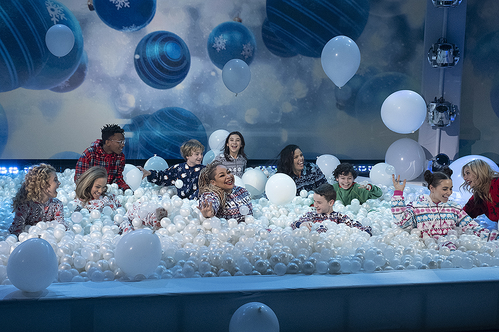 HOLIDAYS UNWRAPPED - Raven-Symoné hosts and performs in this magical holiday special, which will also include performances by fellow Disney Channel stars Issac Ryan Brown, Navia Robinson, Sky Katz ("Raven's Home") and Kylie Cantrall ("Gabby Duran & The Unsittables"). The special will also feature the television premiere of the "Descendants 3" music video "Audrey's Christmas Rewind," along with appearances by Anneliese van der Pol, Jason Maybaum ("Raven's Home") and the cast of "BUNK'D." The Disney Channel Music Event "Holidays Unwrapped," premieres SUNDAY, DECEMBER 8 (8:00 p.m. EST) on Disney Channel and DisneNOW. (Disney Channel/Tony Rivetti)MALLORY JAMES MAHONEY, SHELBY SIMMONS, ISRAEL JOHNSON, WILL BUIE, JR., RAVEN-SYMONÉ,  SCARLETT ESTEVEZ, MIRANDA MAY, JASON MAYBAUM, RAPHAEL ALEJANDRO, SKY KATZ, ANNELIESE VAN DER POL