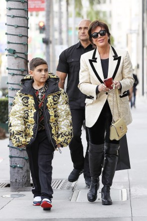 Beverly Hills, CA  - Momager Kris Jenner gets her grandson Mason Disick an expensive looking Versace puffer jacket as they both go Christmas shopping in Beverly Hills with a bodyguard.

Pictured: Kris Jenner, Mason Dash Disick

BACKGRID USA 18 DECEMBER 2018 

BYLINE MUST READ: Clint Brewer / BACKGRID

USA: +1 310 798 9111 / usasales@backgrid.com

UK: +44 208 344 2007 / uksales@backgrid.com

*UK Clients - Pictures Containing Children
Please Pixelate Face Prior To Publication*