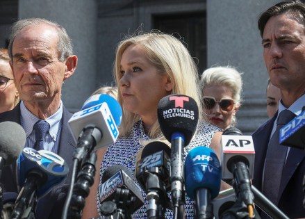 Virginia Roberts Giuffre, center, who says she was trafficked by sex offender Jeffrey Epstein, holds a news conference outside a Manhattan court where sexual assault claimants invited by a judge addressed a hearing following Epstein's jailhouse death in New York. Prince Andrew suffered fresh scrutiny Monday night, Dec. 2, when the woman who says she was a trafficking victim made to have sex with him when she was 17 asked the British public to support her quest for justice
Britain Epstein, New York, USA - 27 Aug 2019