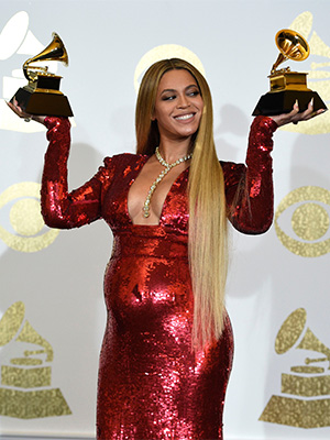 Beyonce poses in the press room with the awards for best music video for "Formation" and best urban contemporary album for "Lemonade" at the 59th annual Grammy Awards at the Staples Center, in Los AngelesThe 59th Annual Grammy Awards - Press Room, Los Angeles, USA - 12 Feb 2017