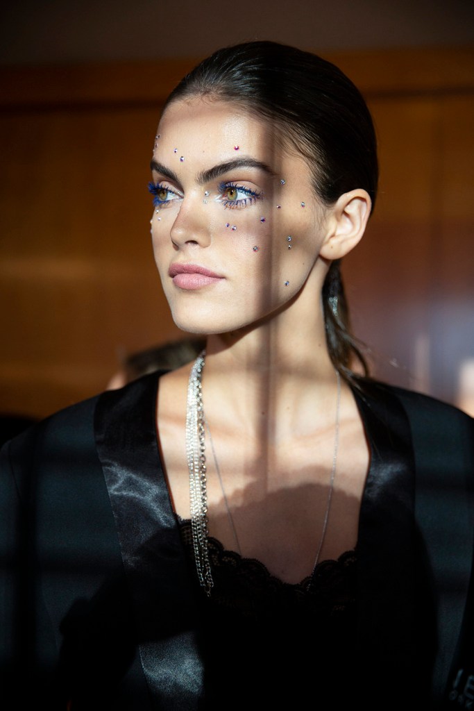 Models get ready backstage for Christian Siriano Fall 2019 show during NYFW
