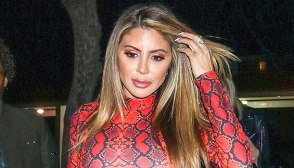 Larsa Pippen in red snakeskin
