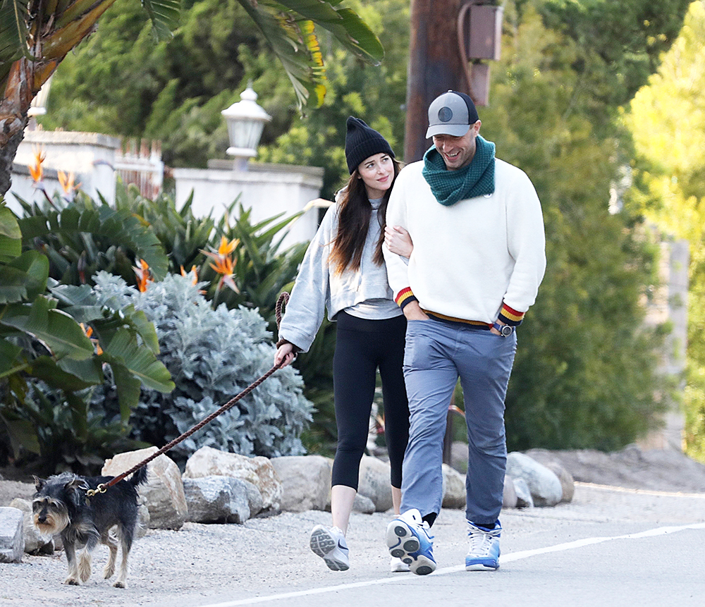 *EXCLUSIVE* Dakota Johnson and Chris Martin take a romantic Sunset Stroll in Malibu