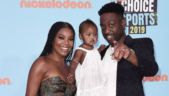 Gabrielle Union & Dwyane Wade with their daughter at the Kids Choice Sports Awards