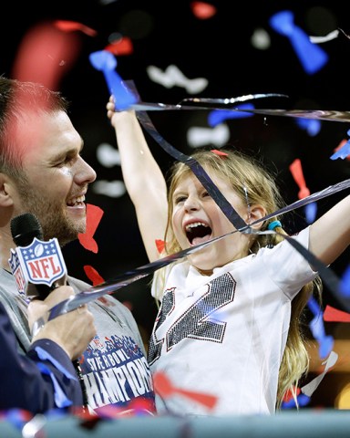 New England Patriots' Tom Brady celebrates with his daughter, Vivian, after the NFL Super Bowl 53 football game against the Los Angeles Rams, in Atlanta. The Patriots won 13-3
Patriots Rams Super Bowl Football, Atlanta, USA - 03 Feb 2019