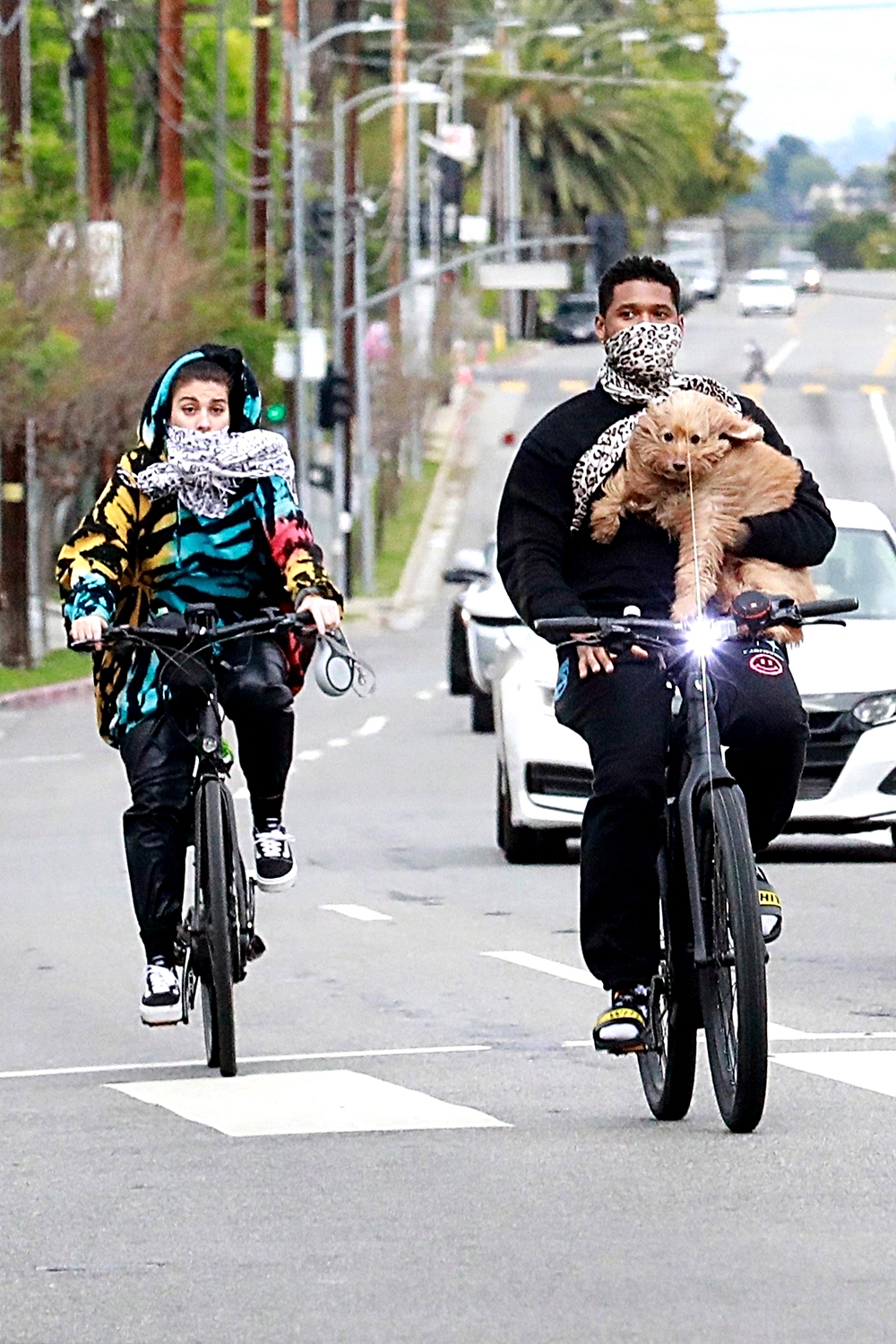 Los Feliz, CA  - *EXCLUSIVE*  - R&B singer Usher takes a joy ride with girlfriend Jennifer Goicoechea and their furry dog.  The couple made a stop at small park where they took a seat to chill out.  User held their dog in his arms for the ride down the street back home.

Pictured: Usher, Jennifer Goicoechea

BACKGRID USA 5 APRIL 2020 

USA: +1 310 798 9111 / usasales@backgrid.com

UK: +44 208 344 2007 / uksales@backgrid.com

*UK Clients - Pictures Containing Children
Please Pixelate Face Prior To Publication*