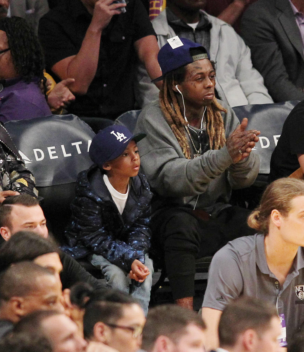 Lil Wayne at the Lakers game with his son