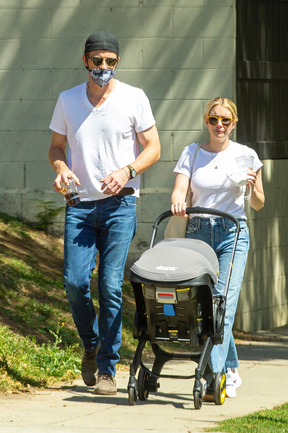 *EXCLUSIVE* Emma Roberts and Garrett Hedlund take Rhodes on a walk to a Coffee Shop