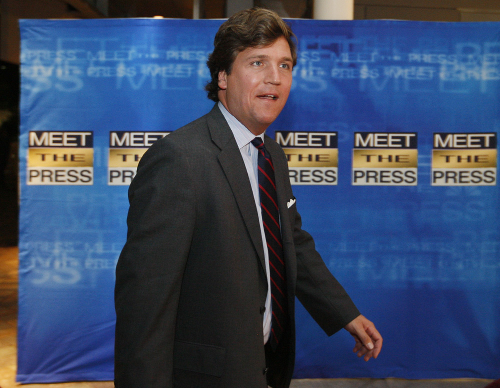 Conservative political commentator Tucker Carlson arrives for the 60th anniversary celebration of NBC's Meet the Press at the Newseum in Washington, Wednesday, Nov. 14, 2007.  (AP Photo/Charles Dharapak)