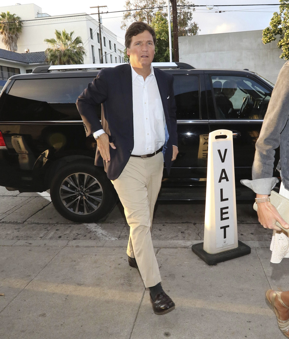 Photo by: gotpap/STAR MAX/IPx 2020 6/11/20 Companies such as T-Mobile and Papa John's Pizza are distancing themselves from Tucker Carlson's television show after he made dismissive comments about the Black Lives Matters movement. STAR MAX File Photo: 4/16/19 Tucker Carlson is seen in Los Angeles, CA.