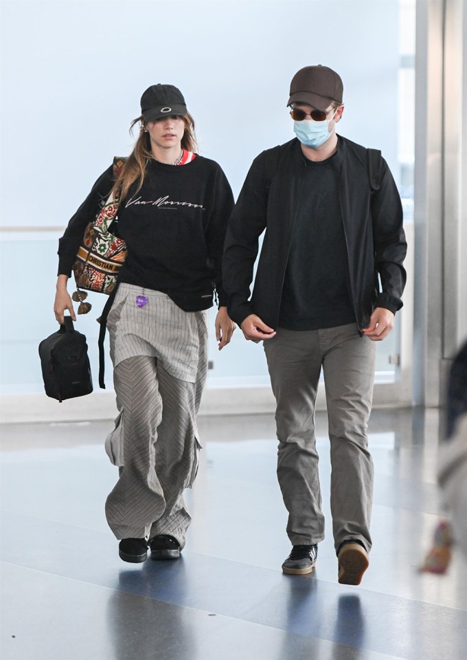 Robert Pattinson & Suki Waterhouse At JFK