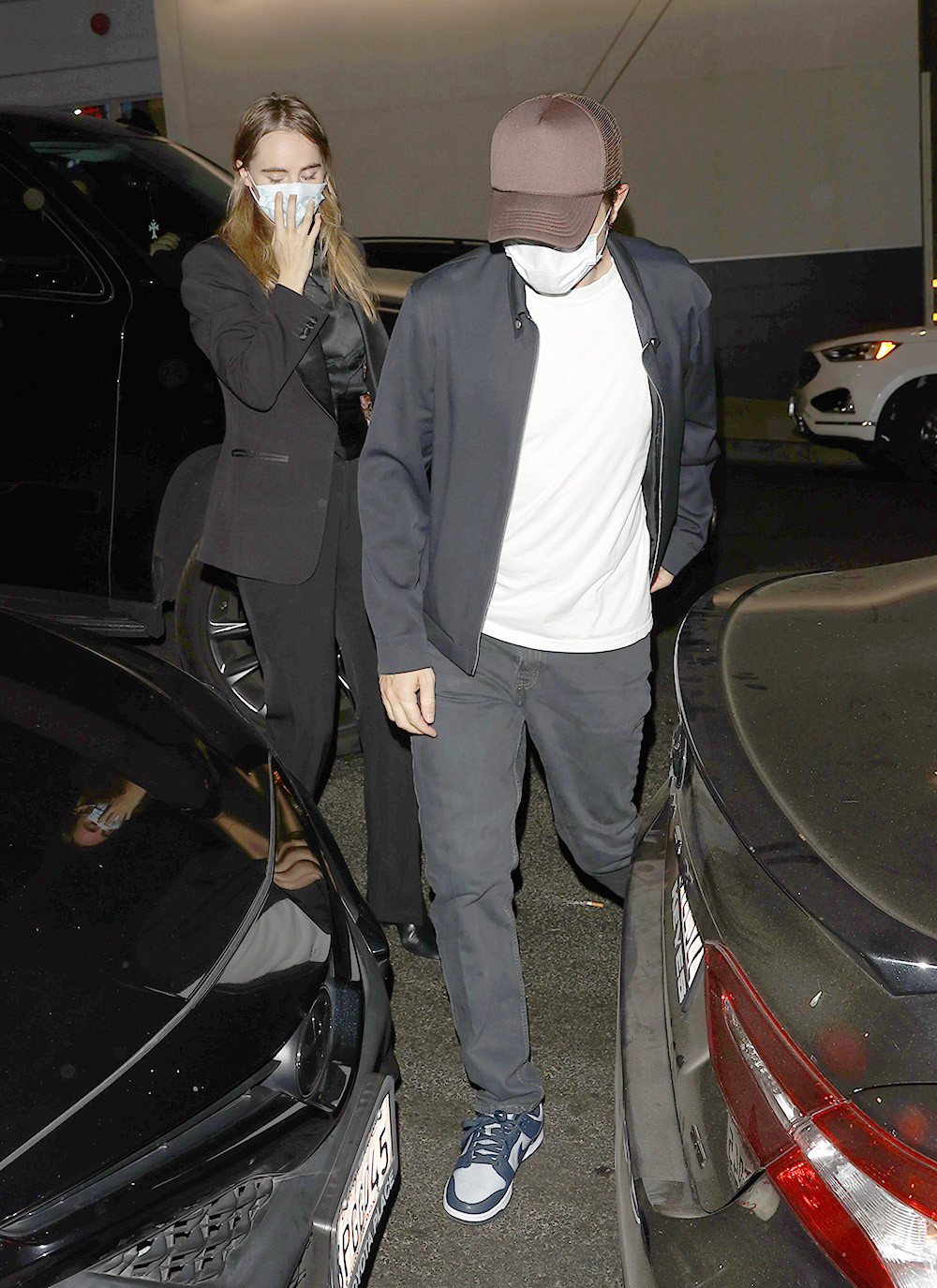 Robert Pattinson and Suki Waterhouse seen arriving at the Viper Room in West Hollywood, CA