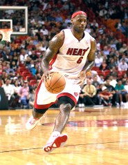 Miami Heat's LeBron James drives against the Detroit Pistons an NBA basketball game in Miami, Wednesday, Dec. 1, 2010. (AP Photo/Alan Diaz)