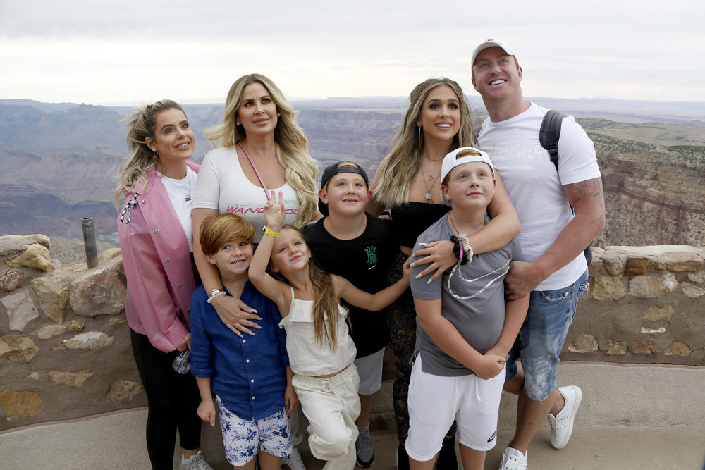 DON'T BE TARDY... -- Pictured: (l-r) Brielle Biermann, Kane Biermann, Kim Zolciak-Biermann, Kaia Biermann, Kash Biermann, Ariana Biermann, KJ Biermann, Kroy Biermann -- (Photo by: Gabe Ginsberg/Bravo)