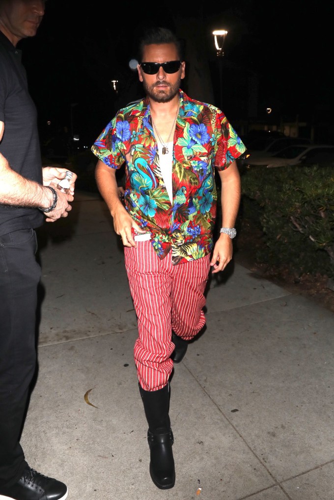 Scott Disick arrives with Amelia Hamlin arrive at a Halloween party