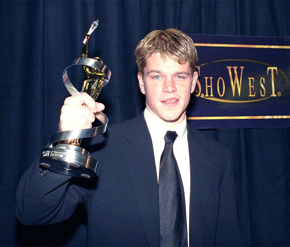 Actor Matt Damon displays his Male Star of Tomorrow award presented to him during the 24th Annual ShoWest Awards ceremony, Thursday night, March 12, 1998, in Las Vegas. Damon won for his work in the movie, "Good Will Hunting." (AP Photo/Lennox McLendon)