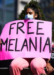 UNITED STATES - OCTOBER 17: A woman holds up a sign as she participates in the Women's March at Freedom Plaza in Washington on Saturday, Oct. 17, 2020. (Photo by Caroline Brehman/CQ Roll Call via AP Images)