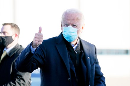 Democratic presidential candidate former Vice President Joe Biden arrives to board his campaign plane at New Castle Airport in New Castle, Del., on Election Day, Tuesday, Nov. 3, 2020, en route to Scranton, Pa. (AP Photo/Carolyn Kaster)