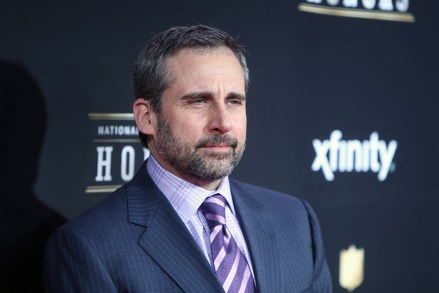 Actor Steve Carrell walks the red carpet before the NFL Honors awards show at the Mahalia Jackson Theatre on Saturday, February 2, 2013 in New Orleans, LA. (AP Photo/Ben Liebenberg)