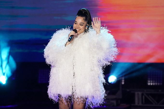 Ella Mai Keeps Warm In Fluffy Feathers