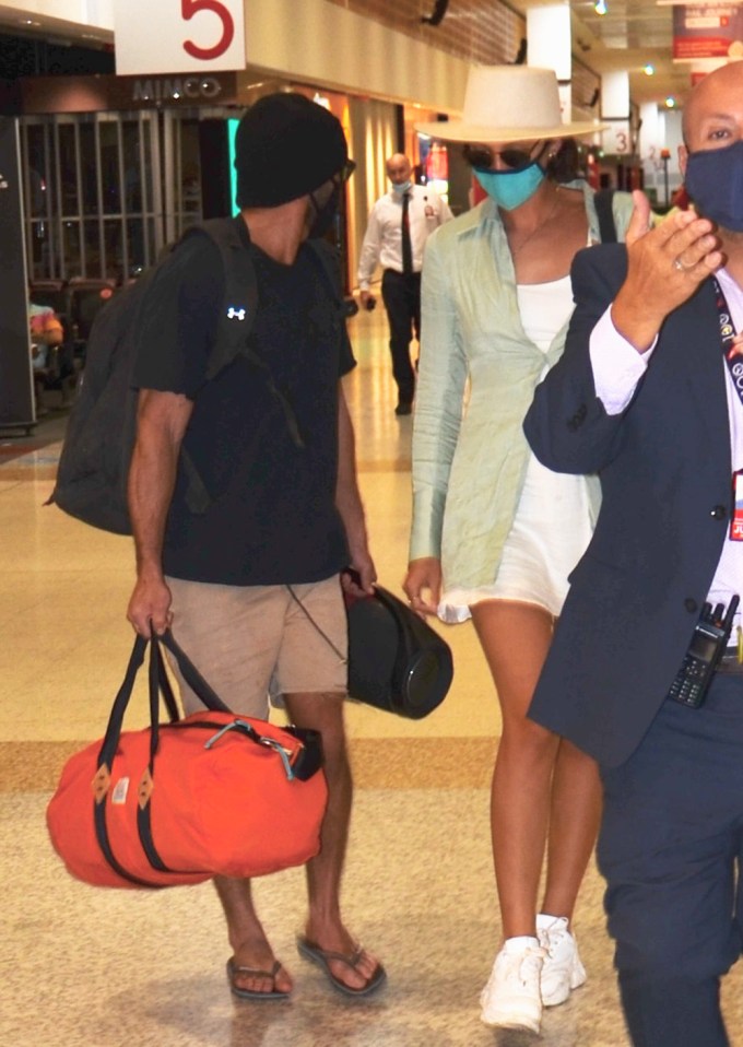 Zac Efron & Vanessa Valladares At The Airport