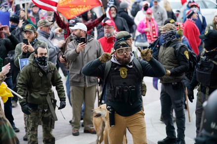 Trump supporters gather outside the Capitol, Wednesday, Jan. 6, 2021, in Washington. As Congress prepares to affirm President-elect Joe Biden's victory, thousands of people have gathered to show their support for President Donald Trump and his claims of election fraud. (AP Photo/Manuel Balce Ceneta)