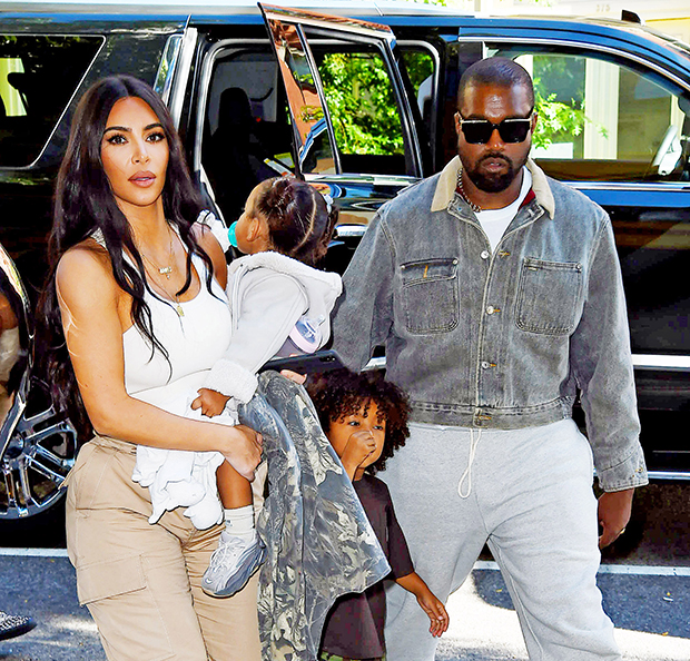 Kim Kardashian & Kanye West with their kids 